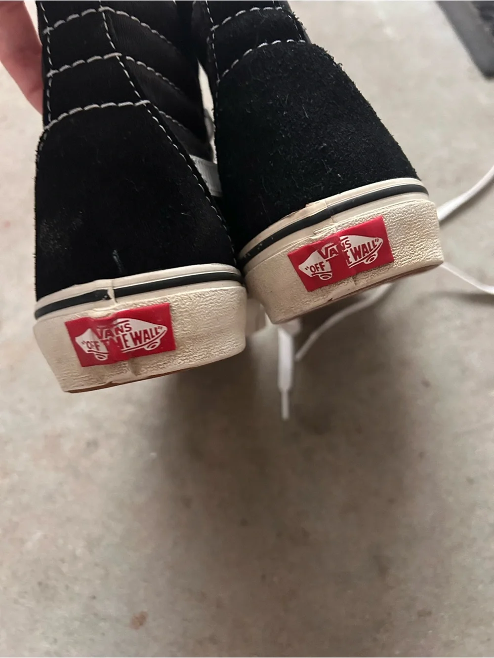 Vans Black and White High-Top Skate Sneakers - Classic Street Style